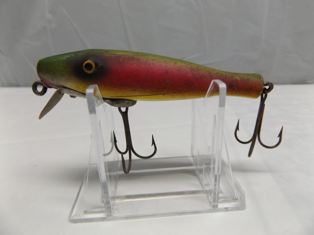 Sold at Auction: PAIR OF POLYCHROME FLOATING POPPING BUG LURES
